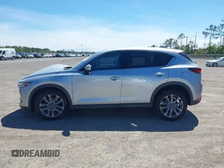 2019 Mazda CX-5 Grand Touring with VIN JM3KFADM1K1606082, listed as a IAAI auction lot 41875878 with 66,089 mi miles. Bid and sale history available at carsss.com. Image 14.