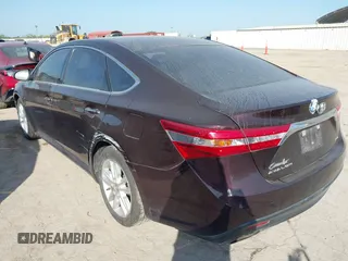 2013 Toyota Avalon XLE with VIN 4T1BK1EB6DU039057, listed as a IAAI auction lot 42011057 with 127,313 mi miles and . Bid and sale history available at DreamBid. Image 3.