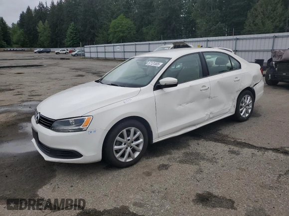 2012 Volkswagen Jetta SE with VIN 3VWDP7AJ5CM301293, listed as a Copart auction lot 57131005 with 93,898 mi miles and Salvage title. Bid and sale history available at DreamBid. Image 1.