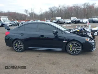 2020 Subaru WRX STI z VIN JF1VA2E6XL9818207, wystawiony jako IAAI lot #41929778 z przebiegiem 33 363 mil mil oraz . Historia ofert i sprzedaży dostępna na DreamBid. Obrazek 13.