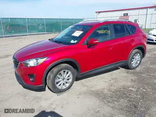 2016 Mazda CX-5 Touring with VIN JM3KE4CY5G0816285, listed as a IAAI auction lot 41888537 with 101,598 mi miles. Bid and sale history available at carsss.com. Image 17.
