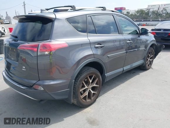 2017 Toyota RAV4 SE with VIN JTMJFREV5HJ155712, listed as a IAAI auction lot 42613998 with 72,112 mi miles and . Bid and sale history available at DreamBid. Image 4.