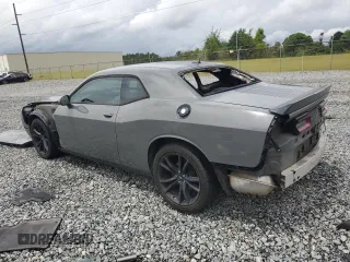 2017 Dodge Challenger SXT z VIN 2C3CDZAG4HH616975, wystawiony jako Copart lot #59321655 z przebiegiem 138 353 mil mil oraz Szkoda całkowita • Salvage title. Historia ofert i sprzedaży dostępna na DreamBid. Obrazek 2.