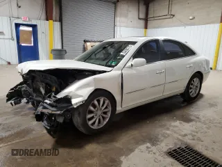 2006 Hyundai Azera SE z VIN KMHFC46F96A136033, wystawiony jako Copart lot #53430715 z przebiegiem Nie podano mil oraz Szkoda całkowita • Salvage title. Historia ofert i sprzedaży dostępna na DreamBid. Obrazek 1.