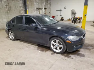 2013 BMW 3 Series 320i with VIN WBA3B1C5XDK130167, listed as a Copart auction lot 60518965 with 129,308 mi miles and Salvage title. Bid and sale history available at DreamBid. Image 4.