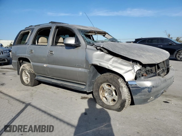 2000 GMC Yukon SLE with VIN 1GKEK13T2YJ130870, listed as a Copart auction lot 82887054 with 310,765 mi miles and Salvage Title. Bid and sale history available at carsss.com. Image 4.