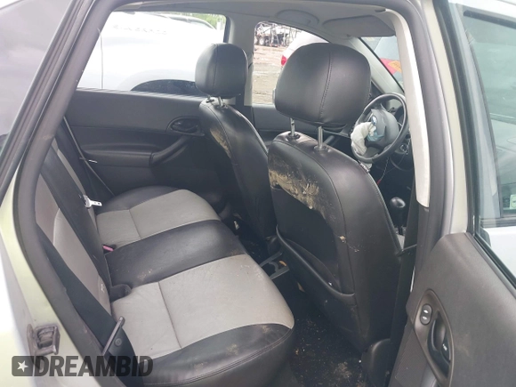 2007 Ford Focus S z VIN 1FAHP34N57W326220, wystawiony jako IAAI lot #42123072 z przebiegiem Nie podano mil oraz . Historia ofert i sprzedaży dostępna na DreamBid. Obrazek 8.