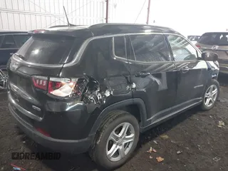 2023 Jeep Compass Latitude with VIN 3C4NJDBN4PT502817, listed as a IAAI auction lot 41650565 with 16,796 mi miles and . Bid and sale history available at DreamBid. Image 4.