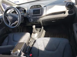 2009 Honda Fit Sport w/Navi with VIN JHMGE88619S020572, listed as a IAAI auction lot 41755126 with 202,358 mi miles. Bid and sale history available at carsss.com. Image 12.