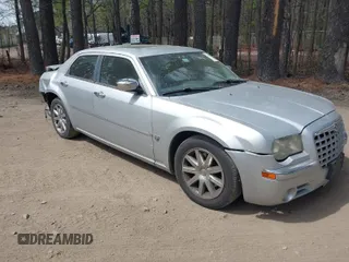 2007 Chrysler 300 C with VIN 2C3KA63H17H896796, listed as a IAAI auction lot 41929716 with 166,803 mi miles. Bid and sale history available at carsss.com. Image 1.