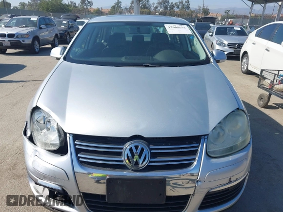 2008 Volkswagen Jetta SE z VIN 3VWRM71KX8M191212, wystawiony jako IAAI lot #42660632 z przebiegiem 198 459 mil mil oraz . Historia ofert i sprzedaży dostępna na DreamBid. Obrazek 12.