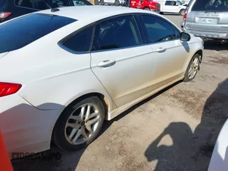 2015 Ford Fusion SE z VIN 3FA6P0H7XFR200759, wystawiony jako IAAI lot #42112951 z przebiegiem 233 652 mil mil oraz . Historia ofert i sprzedaży dostępna na DreamBid. Obrazek 4.
