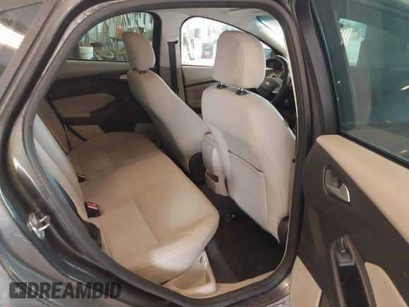 2015 Ford Focus SE with VIN 1FADP3F23FL216154, listed as a IAAI auction lot 42411857 with 127,612 mi miles and . Bid and sale history available at DreamBid. Image 8.