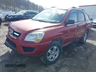 2010 Kia Sportage LX with VIN KNDKGCA39A7702017, listed as a IAAI auction lot 41596204 with 117,670 mi miles and . Bid and sale history available at carsss.com. Image 2.