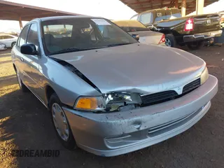 2001 Mitsubishi Mirage ES z VIN JA3AY26C91U002056, wystawiony jako IAAI lot #41354466 z przebiegiem 298 093 mil mil oraz . Historia ofert i sprzedaży dostępna na DreamBid. Obrazek 1.