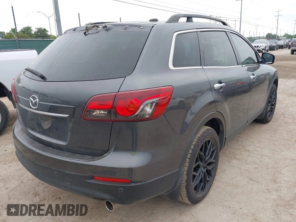 2013 Mazda CX-9 Grand Touring with VIN JM3TB2DA1D0401785, listed as a IAAI auction lot 42034331 with 128,146 mi miles and . Bid and sale history available at DreamBid. Image 4.