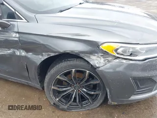 2019 Ford Fusion SEL with VIN 3FA6P0CD6KR141832, listed as a IAAI auction lot 41800102 with 142,282 mi miles and . Bid and sale history available at DreamBid. Image 18.