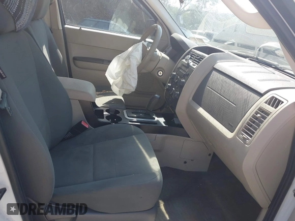2010 Ford Escape XLS with VIN 1FMCU9C70AKD46856, listed as a IAAI auction lot 42583123 with 125,669 mi miles and . Bid and sale history available at DreamBid. Image 5.