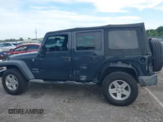 2018 Jeep Wrangler JK Unlimited Sport with VIN 1C4BJWDG5JL858936, listed as a IAAI auction lot 39953617 with 75,865 mi miles. Bid and sale history available at carsss.com. Image 14.