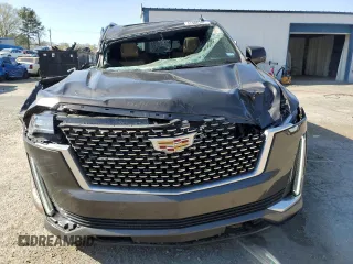 2021 Cadillac Escalade Premium Luxury with VIN 1GYS4CKL6MR249968, listed as a Copart auction lot 47406705 with 28,937 mi miles and Salvage title. Bid and sale history available at DreamBid. Image 5.