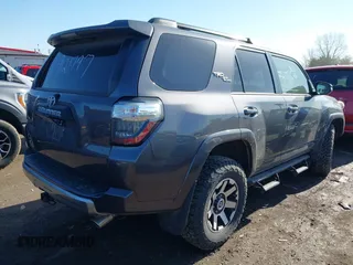 2021 Toyota 4Runner TRD Off Road Premium with VIN JTERU5JR0M5912797, listed as a IAAI auction lot 41796491 with 106,602 mi miles and . Bid and sale history available at DreamBid. Image 4.