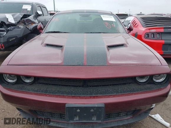 2019 Dodge Challenger SXT z VIN 2C3CDZAGXKH632914, wystawiony jako IAAI lot #42218764 z przebiegiem Nie podano mil oraz . Historia ofert i sprzedaży dostępna na DreamBid. Obrazek 6.