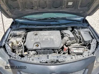 2010 Toyota Corolla z VIN 2T1BU4EE2AC497519, wystawiony jako Copart lot #64614915 z przebiegiem 183 890 mil mil oraz Szkoda całkowita • Salvage title. Historia ofert i sprzedaży dostępna na DreamBid. Obrazek 11.