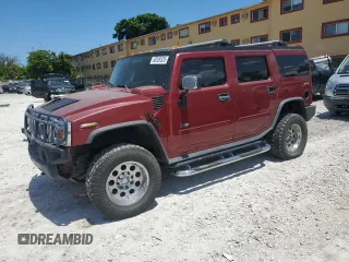 2003 Hummer H2 z VIN 5GRGN23U13H130741, wystawiony jako Copart lot #60209325 z przebiegiem 124 675 mil mil oraz Czysty tytuł • Clean title. Historia ofert i sprzedaży dostępna na DreamBid. Obrazek 1.