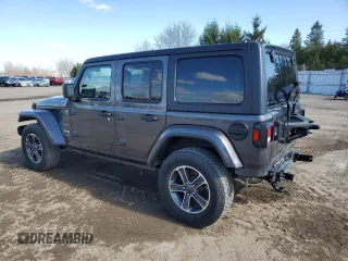 2023 Jeep Wrangler Sahara with VIN 1C4HJXEG5PW632336, listed as a Copart auction lot 54226405 with 23,735 mi miles and Salvage title. Bid and sale history available at DreamBid. Image 2.
