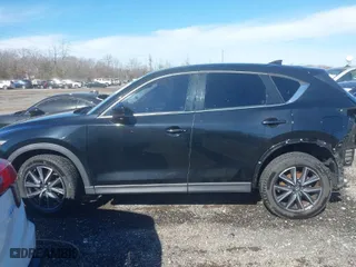 2017 Mazda CX-5 Grand Touring with VIN JM3KFBDL0H0228056, listed as a IAAI auction lot 41611567 with 85,294 mi miles. Bid and sale history available at carsss.com. Image 15.