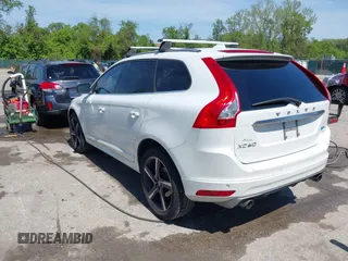 2014 Volvo XC60 R-Design Premier Plus with VIN YV4902DZ0E2546642, listed as a IAAI auction lot 42149824 with 133,669 mi miles and . Bid and sale history available at DreamBid. Image 3.