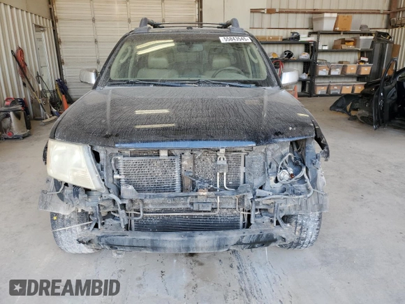 2009 Nissan Frontier LE with VIN 1N6AD09U79C409698, listed as a Copart auction lot 55843545 with 230,334 mi miles and Salvage title. Bid and sale history available at DreamBid. Image 5.
