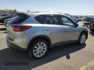 2014 Mazda CX-5 Grand Touring with VIN JM3KE4DY4E0305212, listed as a Copart auction lot 53145305 with 233,061 mi miles and Salvage Title. Bid and sale history available at carsss.com. Image 3.