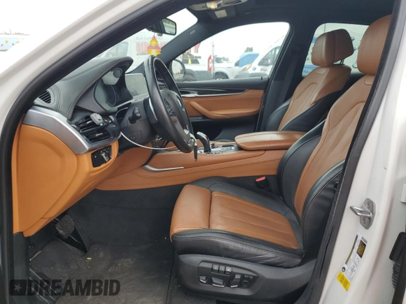 2018 BMW X6 sDrive35i with VIN 5UXKU0C5XJ0G80559, listed as a Copart auction lot 79767994 with 68,731 mi miles and Salvage Title. Bid and sale history available at carsss.com. Image 7.