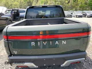 2024 Rivian R1T Adventure z VIN 7FCTGCAA1RN030829, wystawiony jako Copart lot #55557565 z przebiegiem Nie podano mil oraz Szkody całkowita. Historia ofert i sprzedaży dostępna na DreamBid. Obrazek 6.
