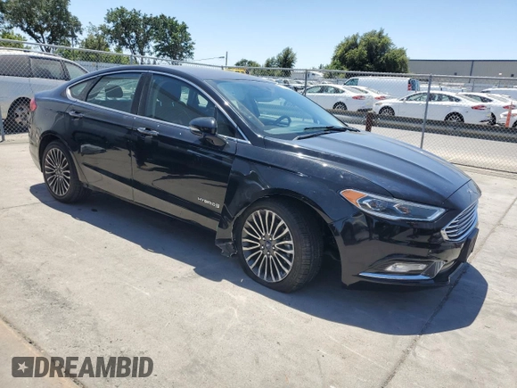 2017 Ford Fusion Hybrid SE with VIN 3FA6P0LU5HR399655, listed as a Copart auction lot 61869085 with 117,420 mi miles and Salvage title. Bid and sale history available at DreamBid. Image 4.