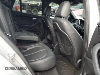 2018 BMW X1 sDrive28i with VIN WBXHU7C32J5H44215, listed as a Copart auction lot 87356474 with 121,828 mi miles and Salvage Title. Bid and sale history available at carsss.com. Image 11.