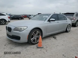 2013 BMW 7 Series 750Li with VIN WBAYE8C56DD133044, listed as a Copart auction lot 49092615 with 169,699 mi miles and Salvage title. Bid and sale history available at DreamBid. Image 1.