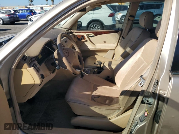 2000 Mercedes-Benz E-Class AWD with VIN WDBJF82G0YX029026, listed as a Copart auction lot 78106604 with 134,482 mi miles and Salvage Title. Bid and sale history available at carsss.com. Image 7.