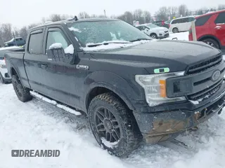 2020 Ford F-150 XL with VIN 1FTFW1E56LFA85818, listed as a IAAI auction lot 41312531 with 122,429 mi miles. Bid and sale history available at carsss.com. Image 1.