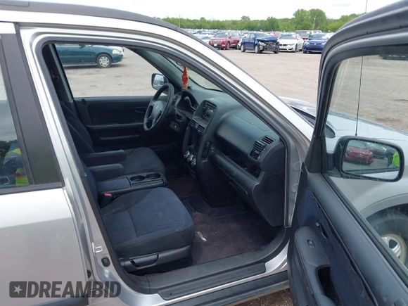 2006 Honda CR-V LX with VIN JHLRD78596C035974, listed as a IAAI auction lot 42119043 with 259,936 mi miles and . Bid and sale history available at carsss.com. Image 5.