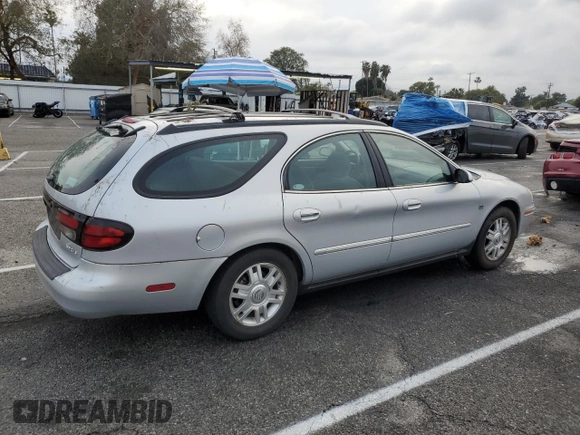 2004 Mercury Sable LS Premium with VIN 1MEHM59S04A608320, listed as a Copart auction lot 43750925 with 93,473 mi miles and Salvage Title. Bid and sale history available at DreamBid. Image 3.