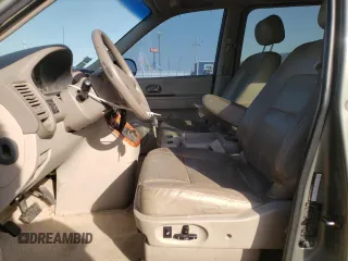2005 Kia Sedona LX with VIN KNDUP132X56695902, listed as a Copart auction lot 73604104 with 109,676 mi miles and Salvage Title. Bid and sale history available at carsss.com. Image 7.