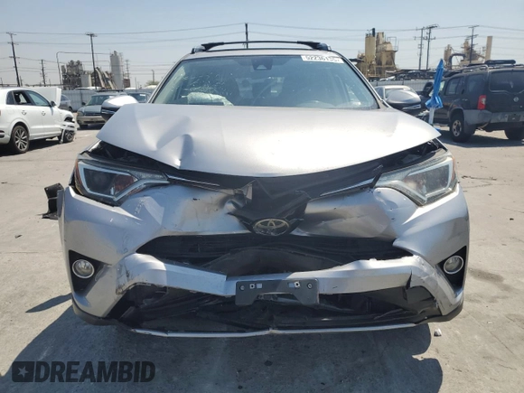 2018 Toyota RAV4 XLE with VIN JTMWFREV1JD119879, listed as a Copart auction lot 52236135 with 79,897 mi miles and Salvage Title. Bid and sale history available at carsss.com. Image 5.
