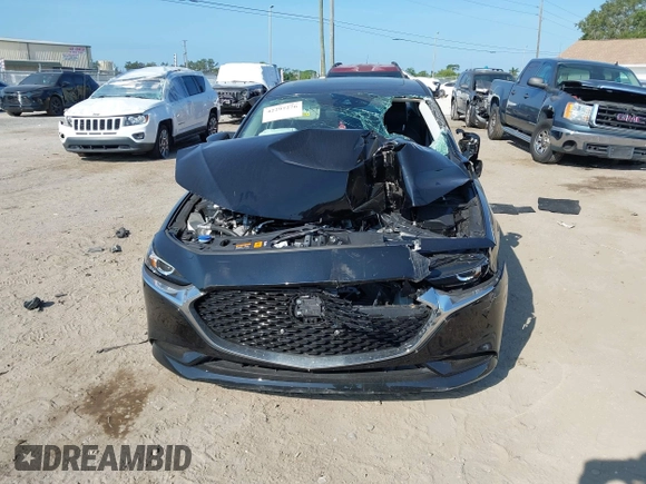 2022 Mazda 3 Carbon Edition с VIN 3MZBPACL2NM310183, выставлен на аукционе IAAI как лот 42297276 с пробегом Не указан миль и . История ставок и продаж доступна на DreamBid. Изображение 6.