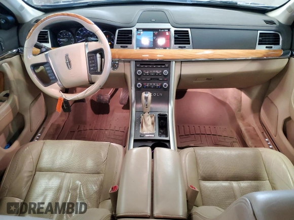 2011 Lincoln MKS EcoBoost z VIN 1LNHL9FT2BG612853, wystawiony jako Copart lot #53654885 z przebiegiem 299 599 mil mil oraz Czysty tytuł • Clean title. Historia ofert i sprzedaży dostępna na DreamBid. Obrazek 8.