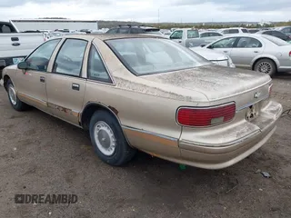 1994 Chevrolet Caprice Classic 1SA Special Value Pkg with VIN 1G1BL52W2RR201821, listed as a IAAI auction lot 41884064 with 186,192 mi miles. Bid and sale history available at carsss.com. Image 3.
