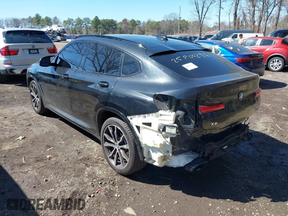 2022 BMW X4 M40i with VIN 5UX43DT04N9K92572, listed as a IAAI auction lot 41985086 with 64,743 mi miles and . Bid and sale history available at DreamBid. Image 3.