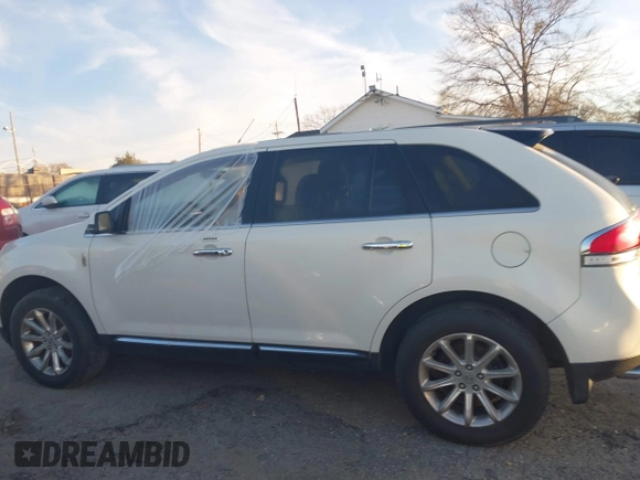 2012 Lincoln MKX with VIN 2LMDJ6JK7CBL11512, listed as a IAAI auction lot 41832419 with 127,485 mi miles. Bid and sale history available at carsss.com. Image 15.