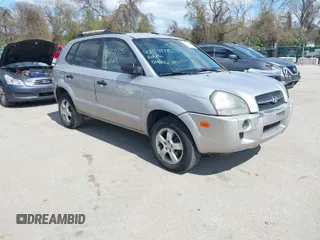 2005 Hyundai Tucson GL with VIN KM8JM12B75U075660, listed as a IAAI auction lot 42037735 with 157,453 mi miles. Bid and sale history available at carsss.com. Image 1.